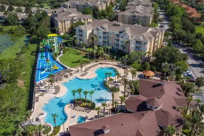 an aerial view of a water park at a resort at Our Mickey Mouse House Townhome with Pool! in Orlando