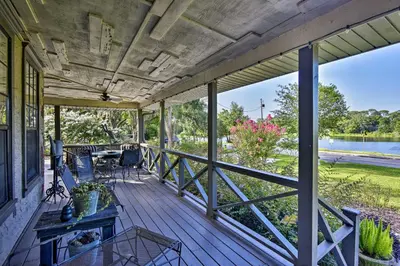 an empty porch with a view of the water at Lake Marion Apt with Canoe in Altamonte Springs! in Orlando
