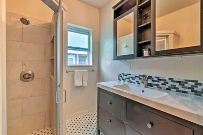 a bathroom with a sink and a shower at Walk to Dtwn Winter Garden Home with Patio in Orlando