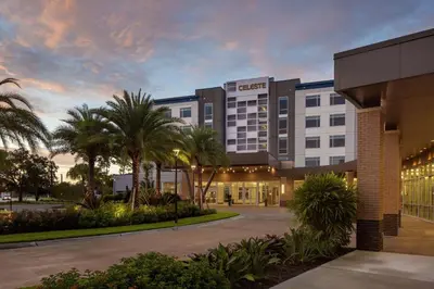a rendering of the east building at dusk at The Celeste Hotel, Orlando, a Tribute Portfolio Hotel in Orlando