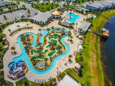 an aerial view of a pool at a resort at Fabulous Thematic 2BR Condo with Kids Splash Pad in Kissimmee