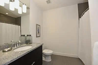 a white bathroom with a sink and a toilet at Beautiful 3-Bed Villa 10 Minutes From Disney-17440 Serenity Resort townhouse in Orlando