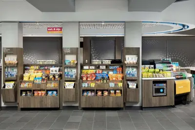 a store filled with lots of different types of food at Tru By Hilton Orlando Convention Center in Orlando