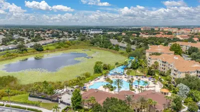 an aerial view of a pool at a resort at Ground Floor at Windsor Hills – 5 Min Disney in Orlando
