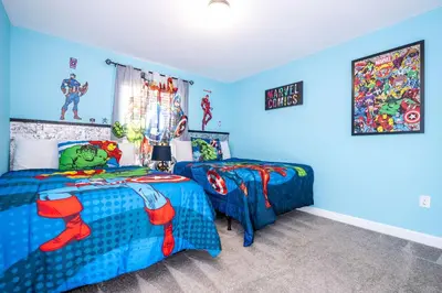 a bedroom with two beds and a spider man bedroom at Gorgeous Four Bd w/ Pool close to Disney 5035 in Kissimmee