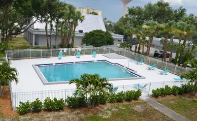 an overhead view of a swimming pool in a yard at Altamonte Springs Hotel and Suites in Orlando