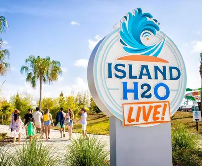 a sign for island hogan live at a beach at Sandy Shores Cottage Near Disney With Margaritaville Resort & Island H2O Access - 8077Kd in Orlando