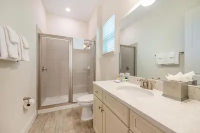 a bathroom with a shower and a toilet and a sink at Life Is Good Cottage Near Disney With Margaritaville Resort & Island H2O Access - 8059Kd in Orlando