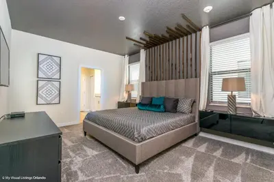 a bedroom with a bed and a window at 2911 Fable Street in Kissimmee