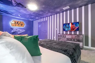 a star wars bedroom with a bed and a tv at 2911 Fable Street in Kissimmee