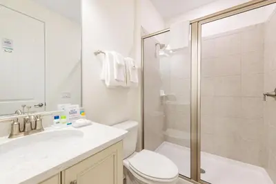 a bathroom with a shower and a toilet and a sink at Fabulous Cottage Near Disney With Margaritaville Resort & Island H2O Access - 8075Kd in Orlando