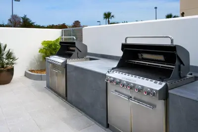 a outdoor kitchen with two burners on a patio at TownePlace Suites by Marriott Orlando Downtown in Orlando