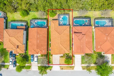 an aerial view of a house with roofs at Newly Remodeled 1 story - 5 Bed 5 Bath with Pvt Pool Spa And Game Room in Kissimmee