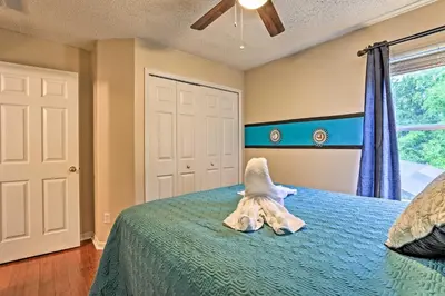 a childs bedroom with a stuffed animal on a bed at 14 Mi to Disney Parks Spacious Kissimmee Home in Kissimmee