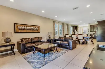 a living room with a couch and a table at 491 Lasso dr in Orlando