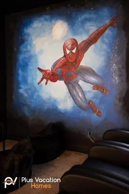 a painting of a spider man on a wall at 331 Villa SpaPool- GamesTheater by Disney in Orlando