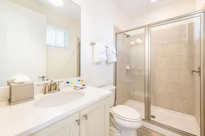 a bathroom with a toilet sink and a shower at Love, Luck And Magic Cottage With Private Hot Tub Near Disney And Margaritaville Resort & Island H2O Access - 8013Ff in Orlando