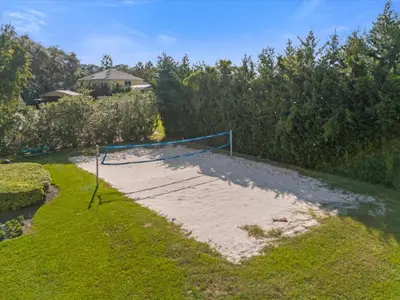 a volleyball net sitting on top of a beach at Spring retreat near Disney, Perfect for families in Kissimmee
