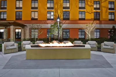 a fire fountain in front of a building at Home2 Suites By Hilton Orlando Flamingo Crossings, FL in Orlando