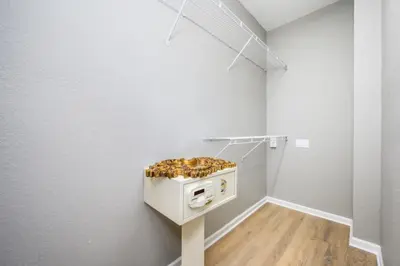 a white room with a toaster on a wall at Gorgeous Vista Cay Town Home, Vista Cay - 4002 in Orlando