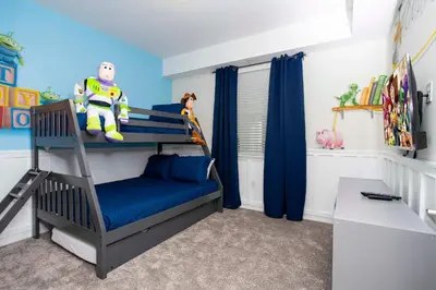 a bedroom with a bunk bed with a spiderman room at Luxurious 2 Bd Close to Disney @ Storey Lake 204P in Kissimmee
