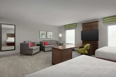 a hotel room with a bed and a desk at Hampton Inn & Suites Orlando North Altamonte Springs in Orlando
