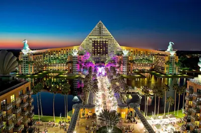 a rendering of the pyramids of dubai at night at Walt Disney World Swan Reserve in Orlando