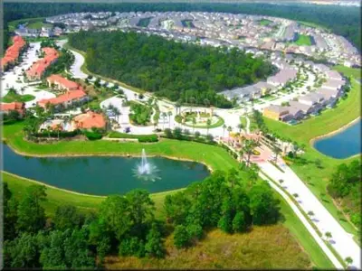an aerial view of a park next to a lake at Serene Pool & Spa, Gated Resort- 2201Em in Kissimmee