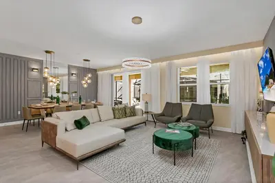 a living room with a couch and a table at 4520 Target Blvd in Kissimmee