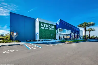 a building with a sign that reads studio movie club at Gorgeous Margaritaville Cottage wPrivate Patio in Orlando