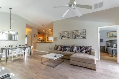 a living room with a couch and a table at 17637 Silver Creek in Orlando