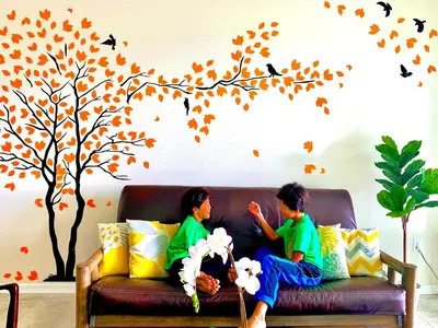 two children sitting on a couch with a tree mural at 3B2B-Beautiful Lake View-Baby Friendly-FREE WATER PARK!NO Resort Fee-5 Miles to Disney-Storey Lake 3141 in Kissimmee