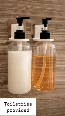 two bottles of soap sitting next to each other at 371P Fabulous 8 BD Private PoolSpa- By Disney in Orlando