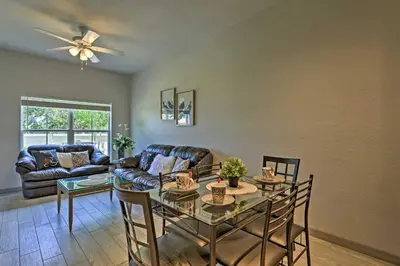 a living room with a table and a couch at 10 Mi to Disney Venetian Bay Villages Retreat in Kissimmee