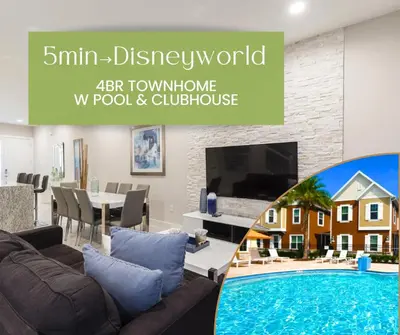 a living room with a couch and a swimming pool at Summerville Resort 4 Bedrooms Villa in Orlando