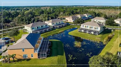 an aerial view of a home with a river at High luxury 3 bedroomloft townhouse in Hidden Forest, with private pool! in Orlando