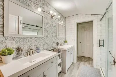 a bathroom with a sink and a mirror at Family Home with Private Pool 24 Mi to Disney! in Saint Cloud