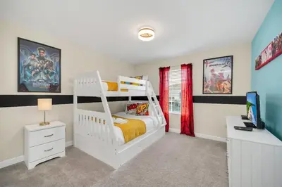 a bedroom with a white bunk bed and a desk at Spacious and Luxurious Home With Splash Pool, Close to Disney #4ST804 in Kissimmee