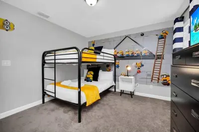 a bedroom with two bunk beds and a ladder at Appealing, Large 5BD Home Close to Themed-Parks #5PP961 in Kissimmee