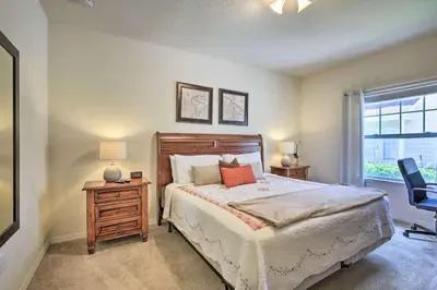 a bedroom with a bed and a desk and a window at Marvelous 3 Bd Close To Disney @ Lucaya Resort 107 5364 in Kissimmee