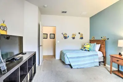 a bedroom with a bed and a flat screen tv at Marvelous 3 Bd Close To Disney @ Lucaya Resort 107 5364 in Kissimmee