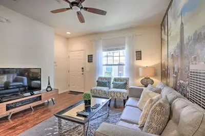 a living room with a couch and a flat screen tv at Marvelous 3 Bd Close To Disney @ Lucaya Resort 107 5364 in Kissimmee