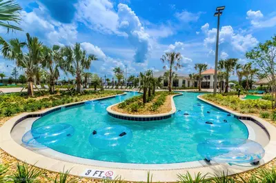 a pool at a resort with blue water at Lovely Private Pool Villa wFREE Resort Access in Kissimmee