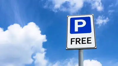 a free sign in front of a cloudy sky at Home 1 Suites Extended Stay - Kissimmee in Kissimmee