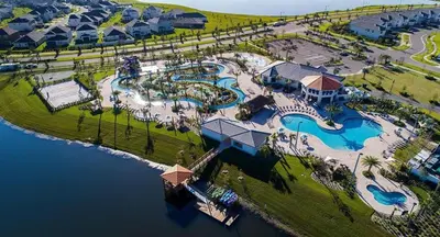 an aerial view of the pool at a resort at Great apartment in Storey Lake resort with great amenities next to Disney! in Kissimmee