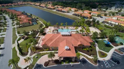 an aerial view of a resort with a swimming pool at 3Br 3Bath Townhome BBQ Pool 15min Disney 1291ft in Kissimmee