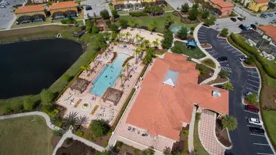 an overhead view of a resort with a swimming pool at 3Br 3Bath Townhome BBQ Pool 15min Disney 1291ft in Kissimmee