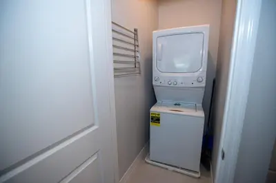 an old television sitting on top of a refrigerator at Pet Friendly Modern Zen Studio Retreat with Hot Tub! home in Orlando