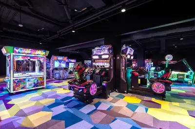 a room with arcade games and video game machines at Westgate Town Center Resort in Orlando
