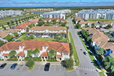 an aerial view of a residential neighborhood with houses at Refurbished! Lazy Life At Storey Lake By Shine Villas #901 in Kissimmee